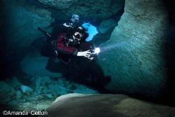 Cave Diving

Cave Diver making his way through the cave... by Amanda Cotton 
